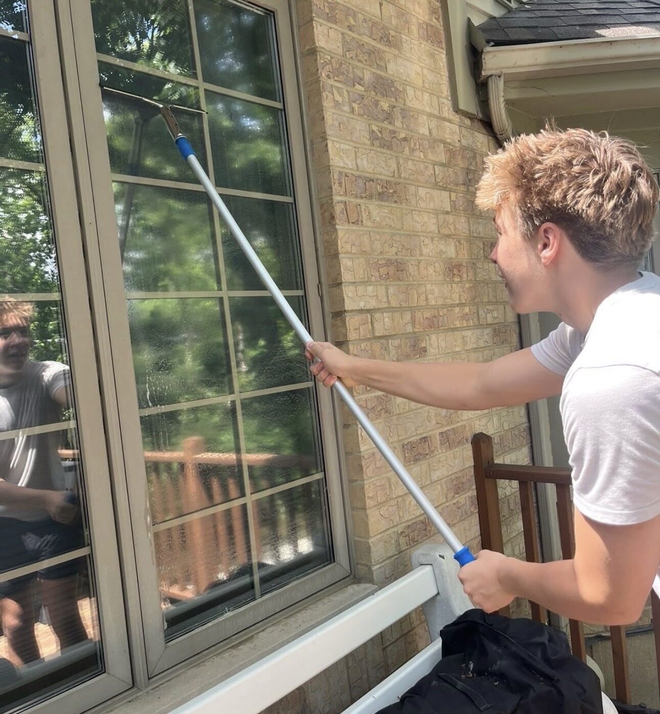 Close-up of window and screen cleaning by Ultra View